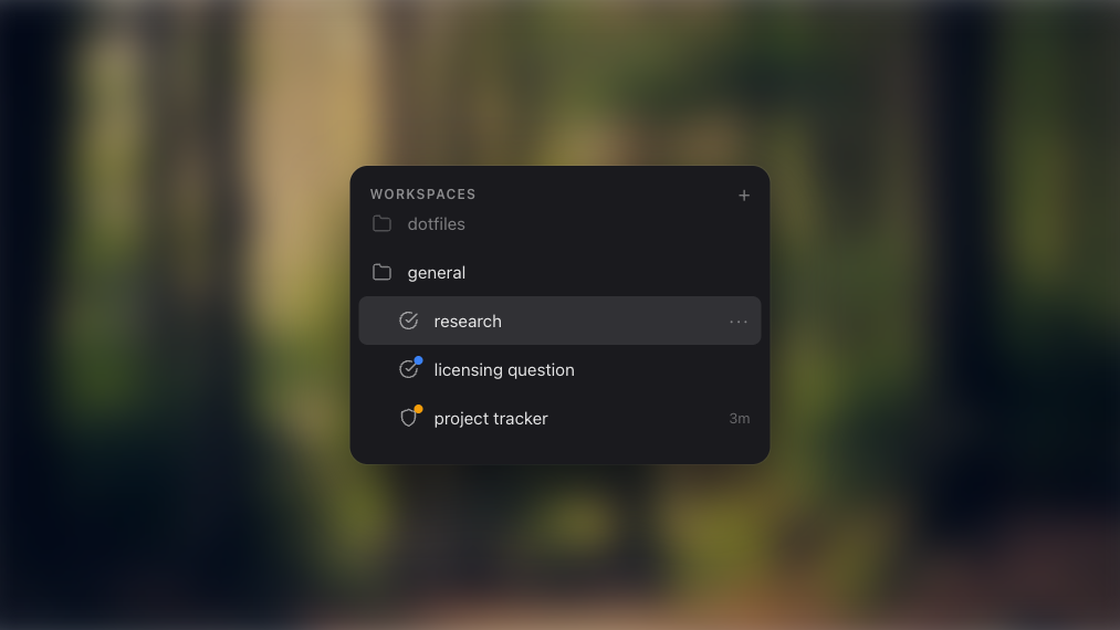 Sidebar showing blue and orange attention dots on workspace tabs